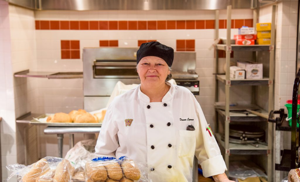 Donna Cuzzone, a dining services attendant, has been a key presence on campus for over ten years. Katie Brule/Photo Editor