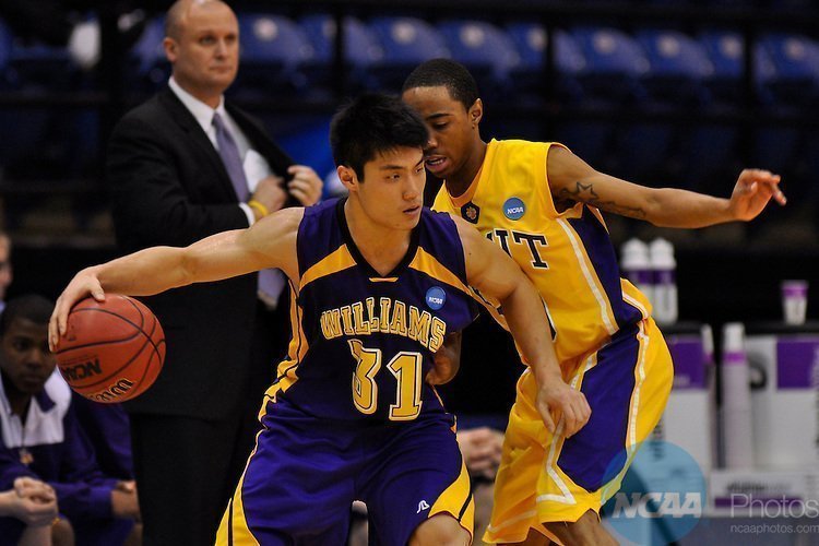 20 MAR 2010:  Guard James Wang (31) of Williams College attempts to drive past freshman Guard Jerrel Harris (10) of Wisconsin-Stevens Point during the Division III MenÕs Basketball Championship held at the Salem Civic Center in Salem, VA.  Wisconsin-Stevens Point defeated Williams 78-73 to win the national title.  Andres Alonso/NCAA Photos