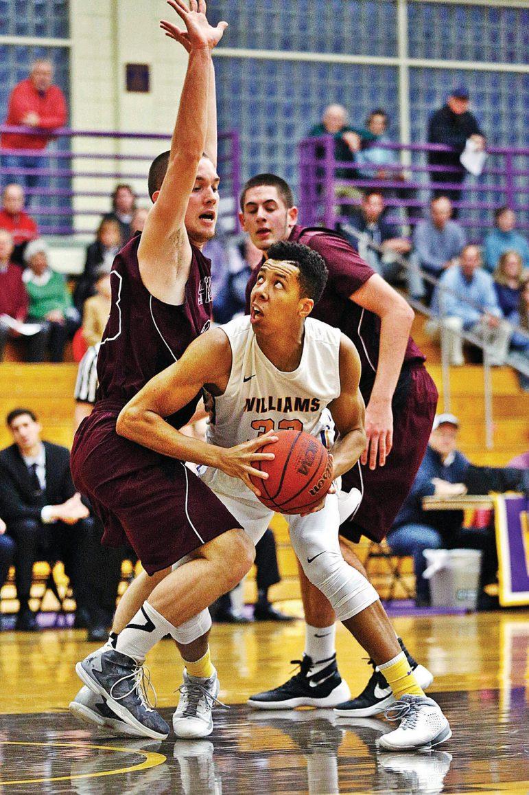 Williams Kyle Scadlock looks up to the basket in a basketball game against Springfield College in a home game at Williams College in Williamstown. Saturday, December 12, 2015. Stephanie Zollshan — The Berkshire Eagle.