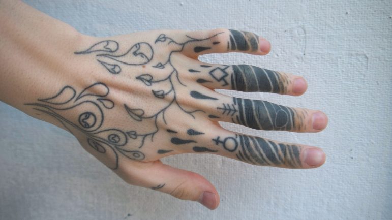 eva henderson ’19, whose hand tattoo art is shown above, works in a variety of art mediums at the College. Photo courtesy of eva henderson. 