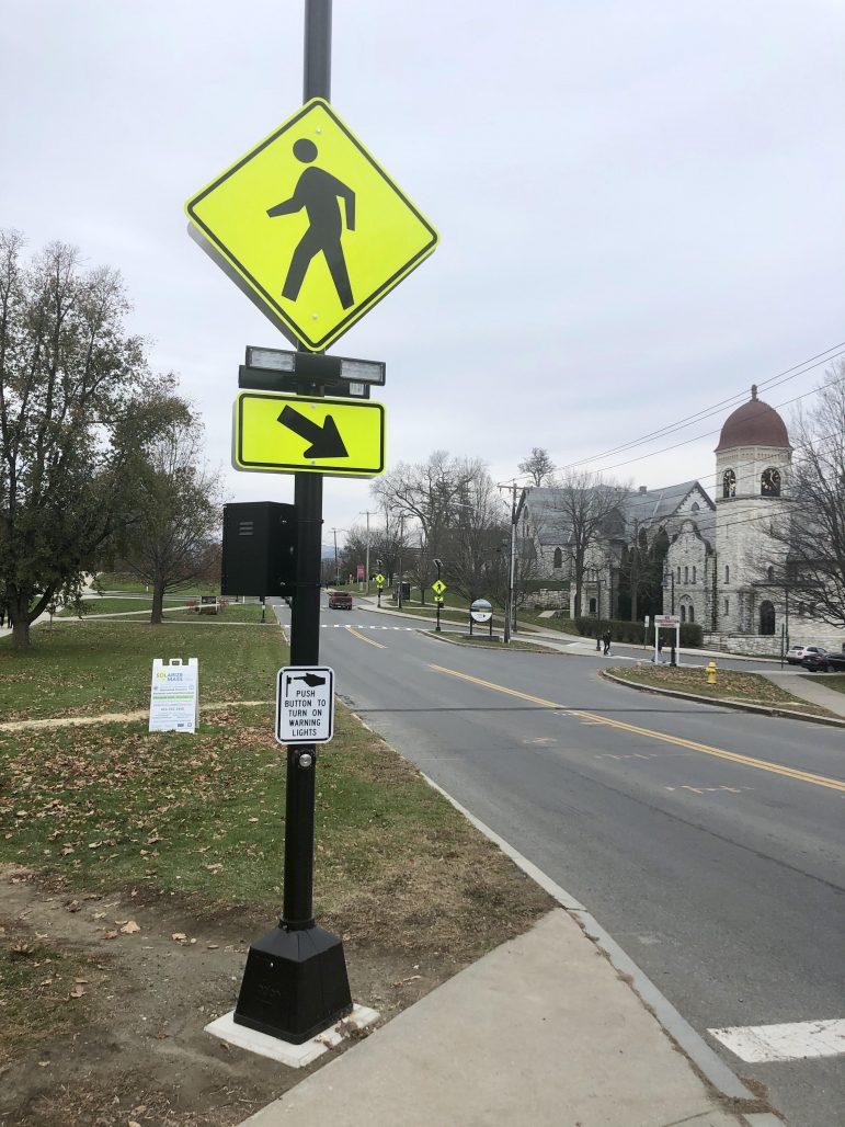 Town installs new pedestrian crossing lights, signs along Main Street