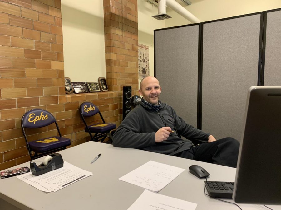 Despite not being able to see his athletes in person, mens wrestling coach Scott Honecker continues coaching and recruiting from his office with the help of technology. (Photo courtesy of Scott Honecker.)