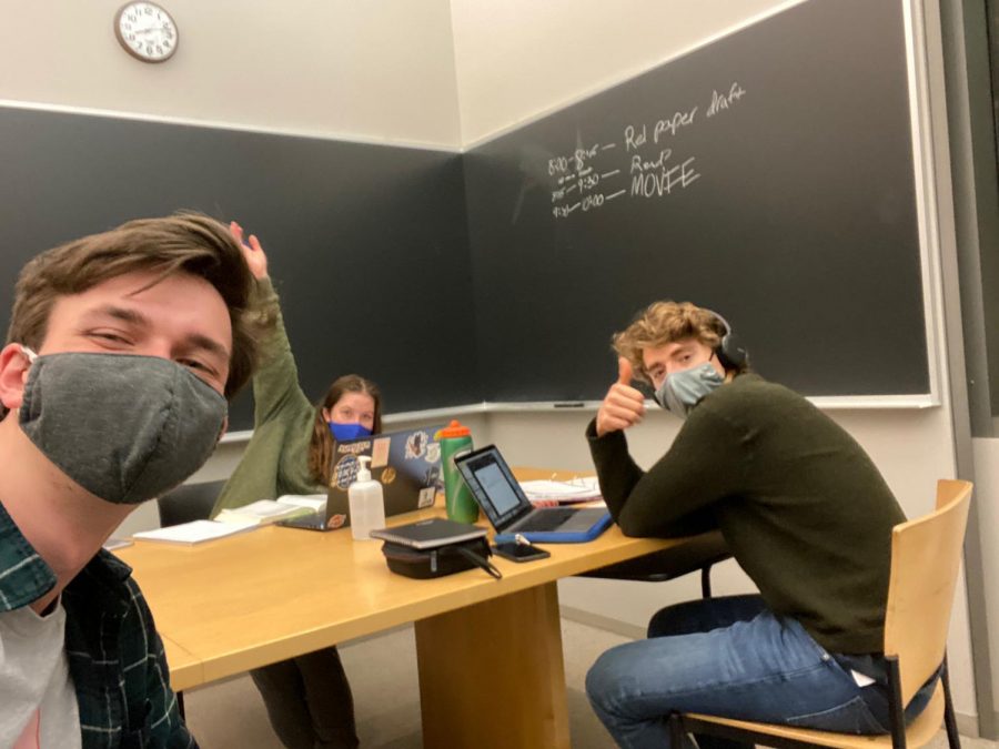 Peter Miles ’24 (right) spends time with friends Andrew Nachamkin ’24 (left) and Frances Hayward ’24 (back) during a late-night study session. (Photo courtesy of Peter Miles.)