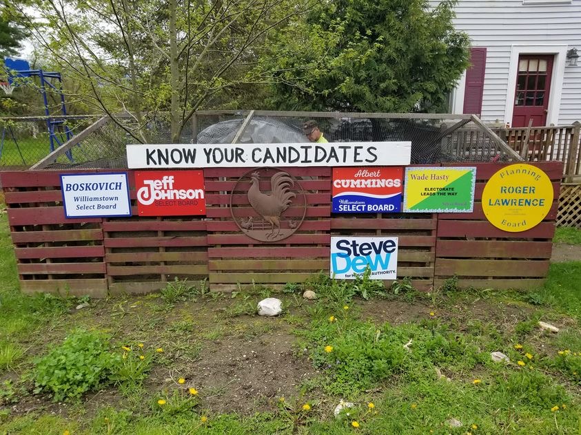 Yard signs for the four Select Board candidates have taken over the Town’s lawns and green spaces. (Photo courtesy of Andi Bryant.)