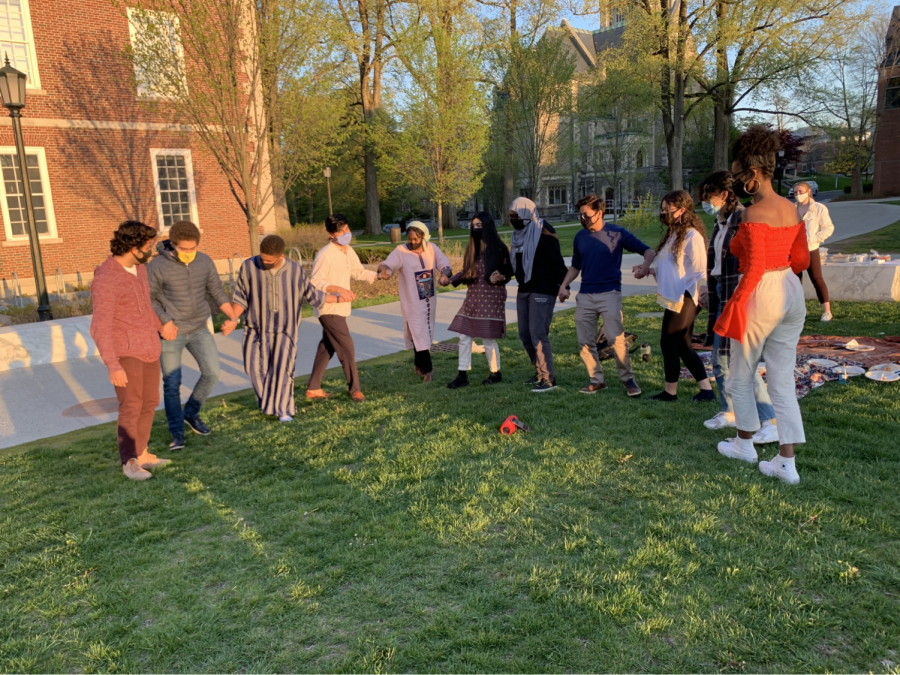 Students burst into impromptu dancing during Eid celebrations in front of Sawyer Library. (Photo courtesy of Mohammad Faizaan.)