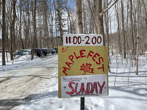 The Hopkins Memorial Forest hosted its first community-wide Maplefest after a three-year hiatus, with activities ranging from maple sap boiling in the sugar house to tree-tapping demonstrations. (Luke Chinman/The Williams Record.)