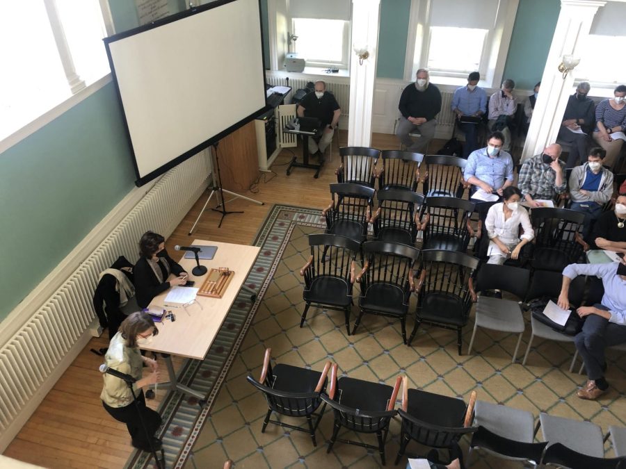 At the faculty meeting in Griffin Hall, the faculty prepares to vote on the CEA’s motion to eliminate the swim requirement. (Irene Loewenson/The Williams Record)