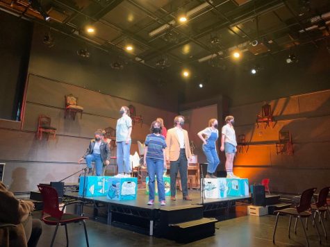Isaac Wilkins ’22 (center right) and the cast of Fun Home perform the opening number, “It All Comes Back.” (Photo courtesy of Joe Fox.)