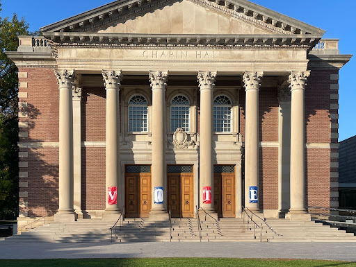 Large banners that together read “VOTE” were placed on Chapin Hall’s columns as part of efforts by EphVotes to encourage higher voter turnout among students at the College. (Luke Chinman/The Williams Record)