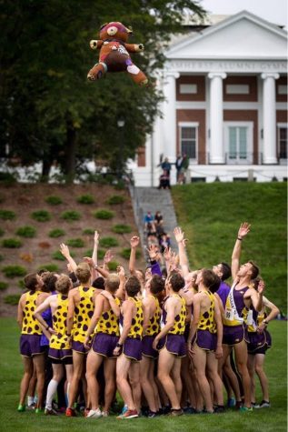 The mens cross country team tosses T-Bear before every race (Photo courtesy of Elias Lindgren)