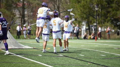 The men’s lacrosse team beat the Amherst Mammoths 11-10 in an intense game on Saturday afternoon. (Photo courtesy of Sports Information.)