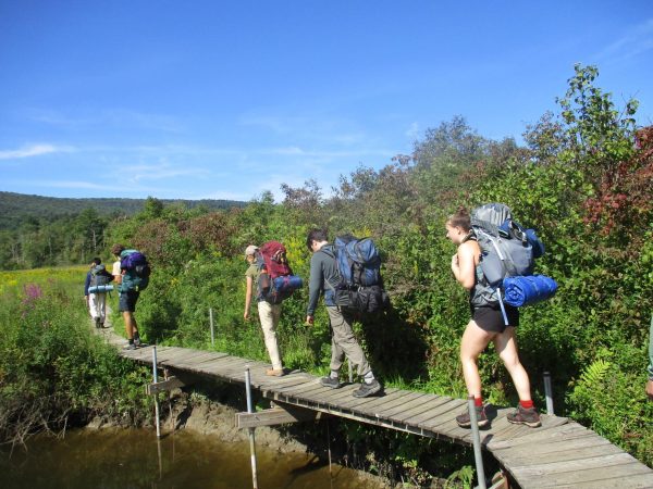 Students in “B25: Will We Survive?!” hike during their backpacking trip. (Photo courtesy of Claire McDonald.)