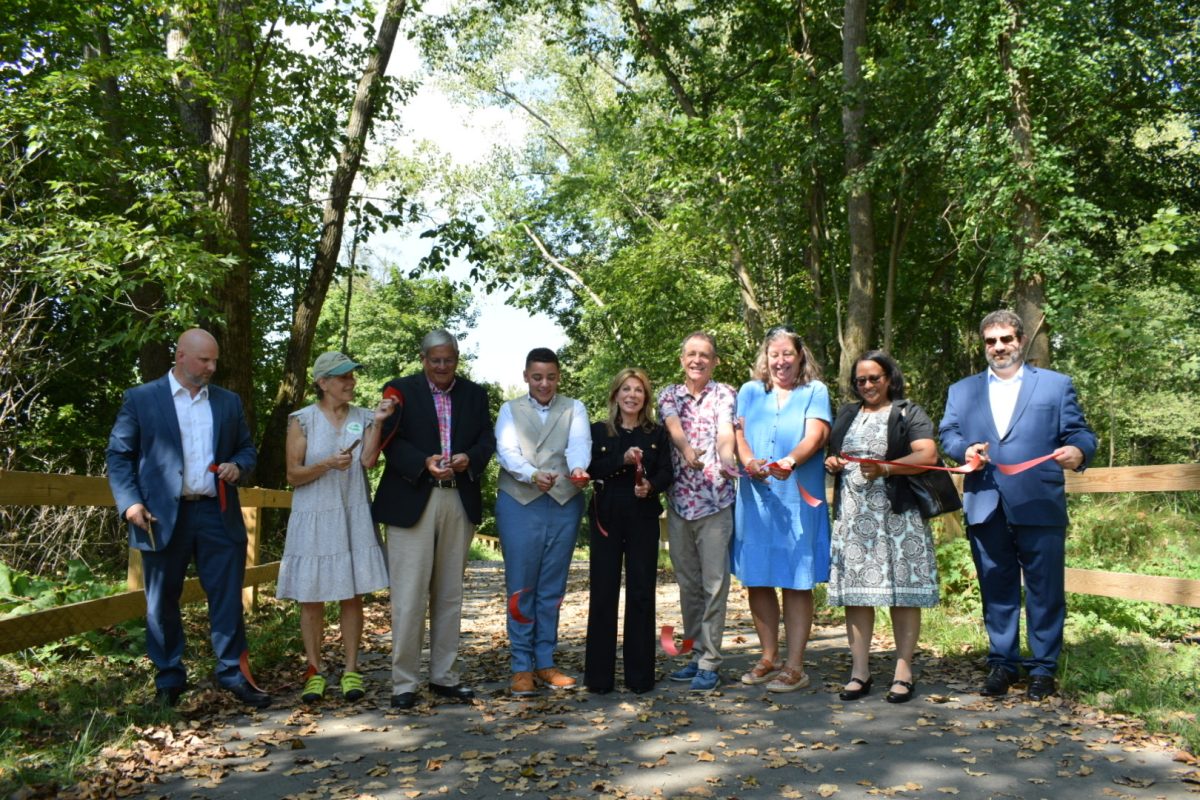 Representatives from MassDOT, the Select Board, state legislature, and the Williamstown community spoke at a ribbon-cutting ceremony celebrating the completion of the Mohican Trail. (Lindsay Wang/The Williams Record)
