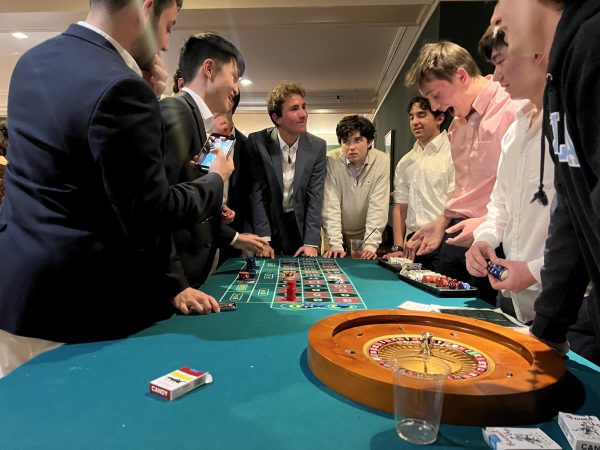 Dodd House transformed into Las Vegas for ACE’s annual Casino Night, where students placed bets and won big. (Quinn Casey/The Williams Record)