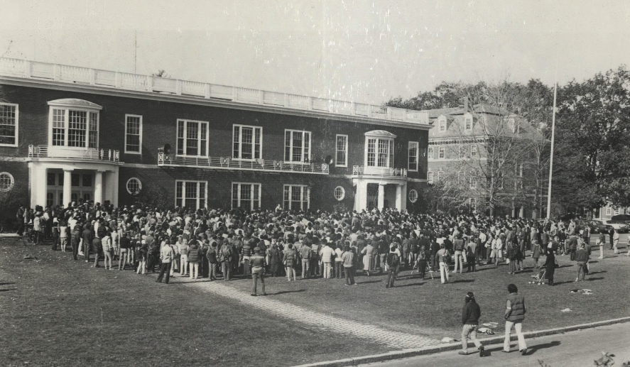 On Nov. 3, 1980, nearly 1,200 students at the College gathered outside Baxter Hall in a rally to protest the Perry House cross burning. (Photo courtesy of Special Collections.)