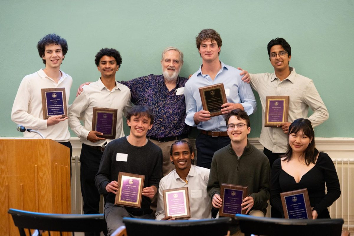 Quinn presented select employees with Deford-Pinsky awards. (Photo courtesy of Williams Today.)