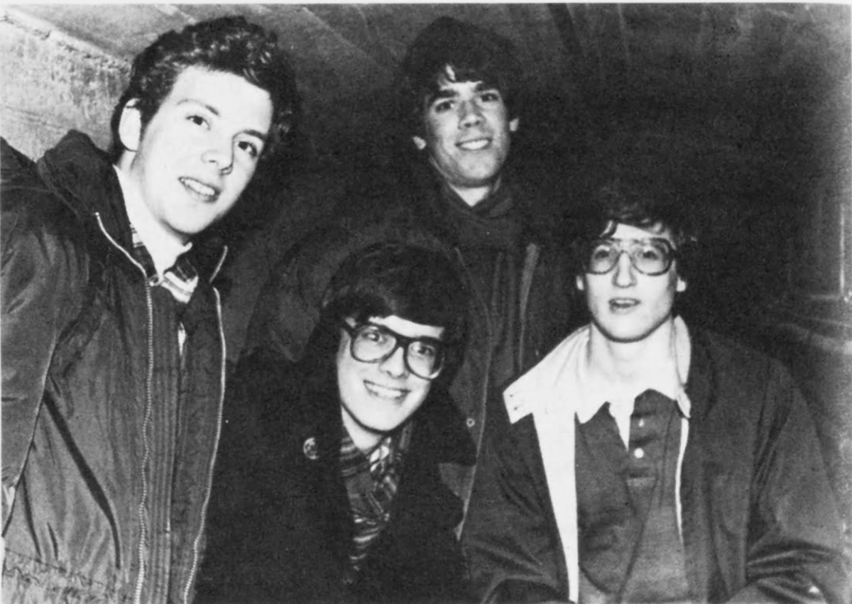 Record editors Steve Willard ’82, Stephen Spears ’83, Eric Schmitt ’82, and Richard Henderson ’83 pose in a steam tunnel while on a self-guided tour early on a Monday morning. (Photo courtesy of Stephen ‘Animal’ Farley).